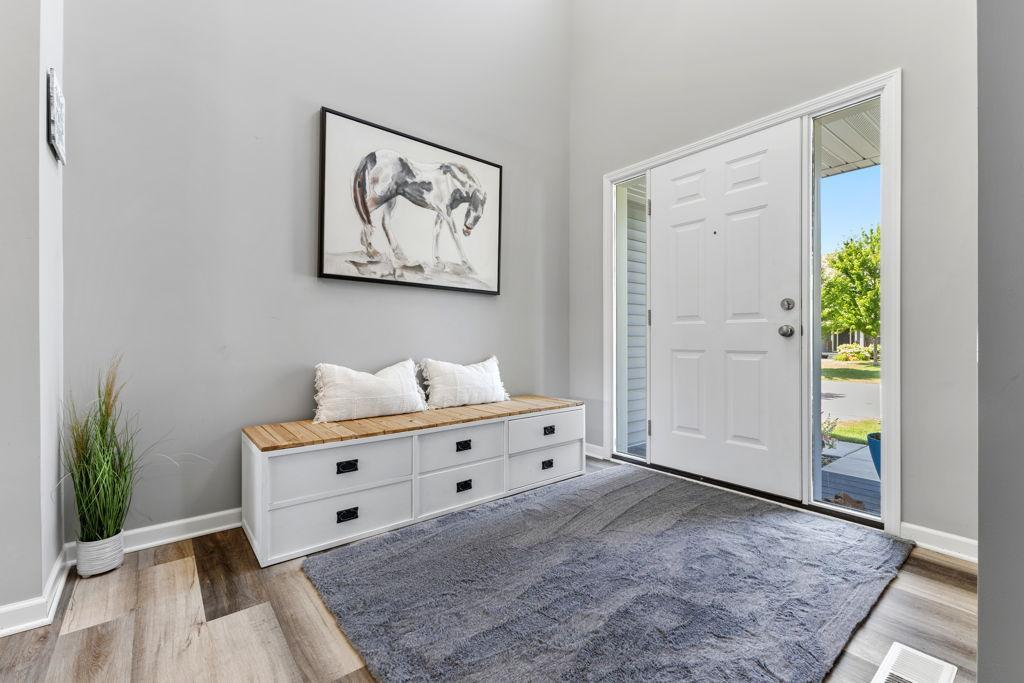Light-bright 2- story foyer. To the right of this photo is currently an office but can also be used as a den, a music room, a play room...endless options!