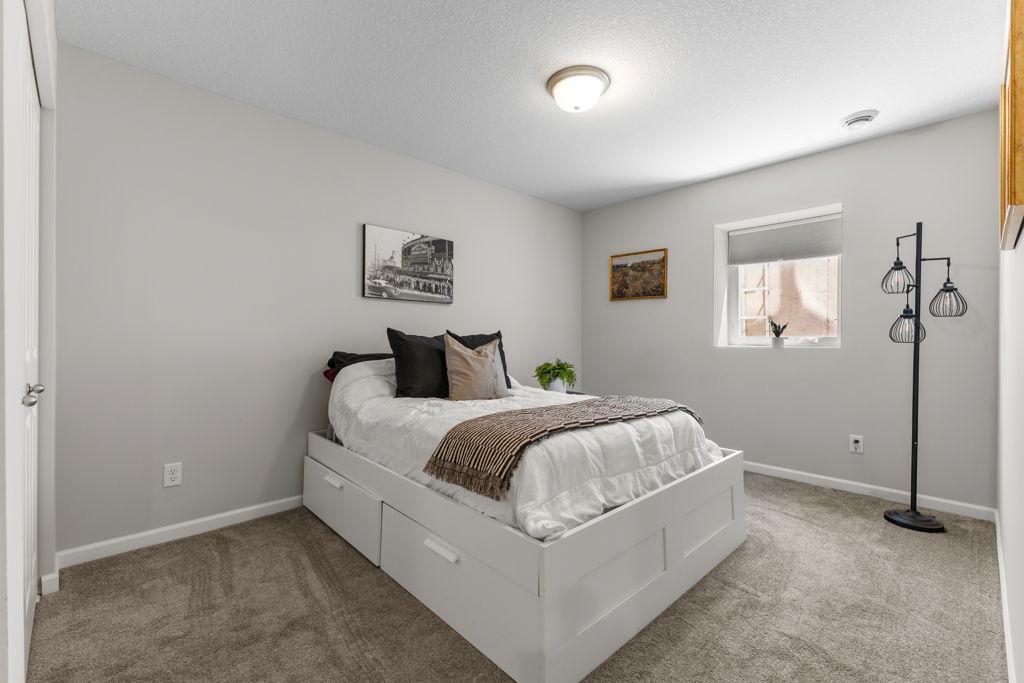 This is the 5th bedroom in the home. The egress window faces the east (backyard).
