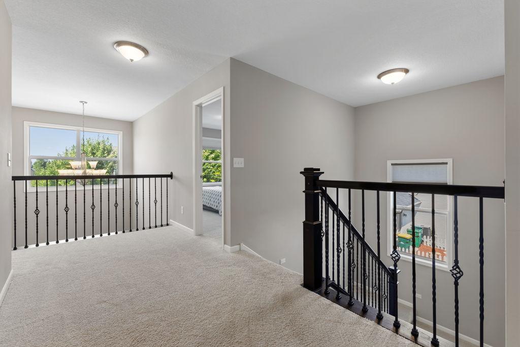Upper level landing. Two bedrooms are west facing and two bedrooms are east facing.