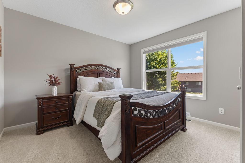 One of the two east facing bedrooms that overlook the backyard. The closet is to the right of this photo.