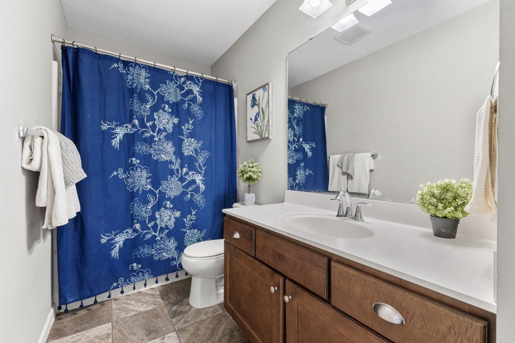 Full bathroom on the upper level.