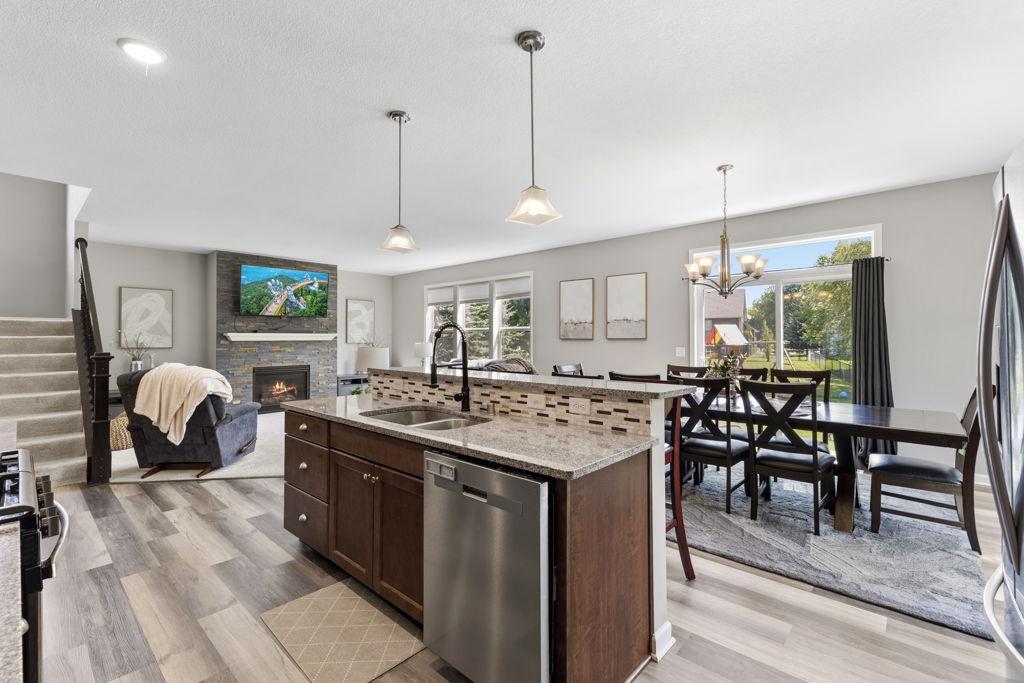 A center island that is multi-functional. Prep room on one side and built up for the sitting side.