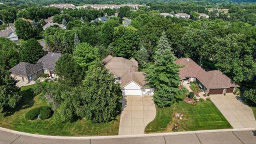 Nestled within an exclusive 13-home community, this beautifully maintained property offers one of the neighborhood's larger and more private homesites.