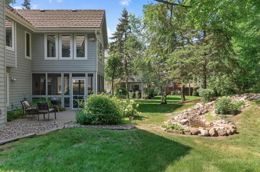 Exceptional craftsmanship continues outside with premium materials and beautifully maintained landscaping.