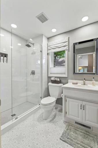 A beautifully renovated bath that blends luxury and functionality.