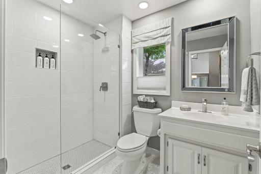 Completely remodeled and enlarged from a half bath to a 3/4 bath on the main level.