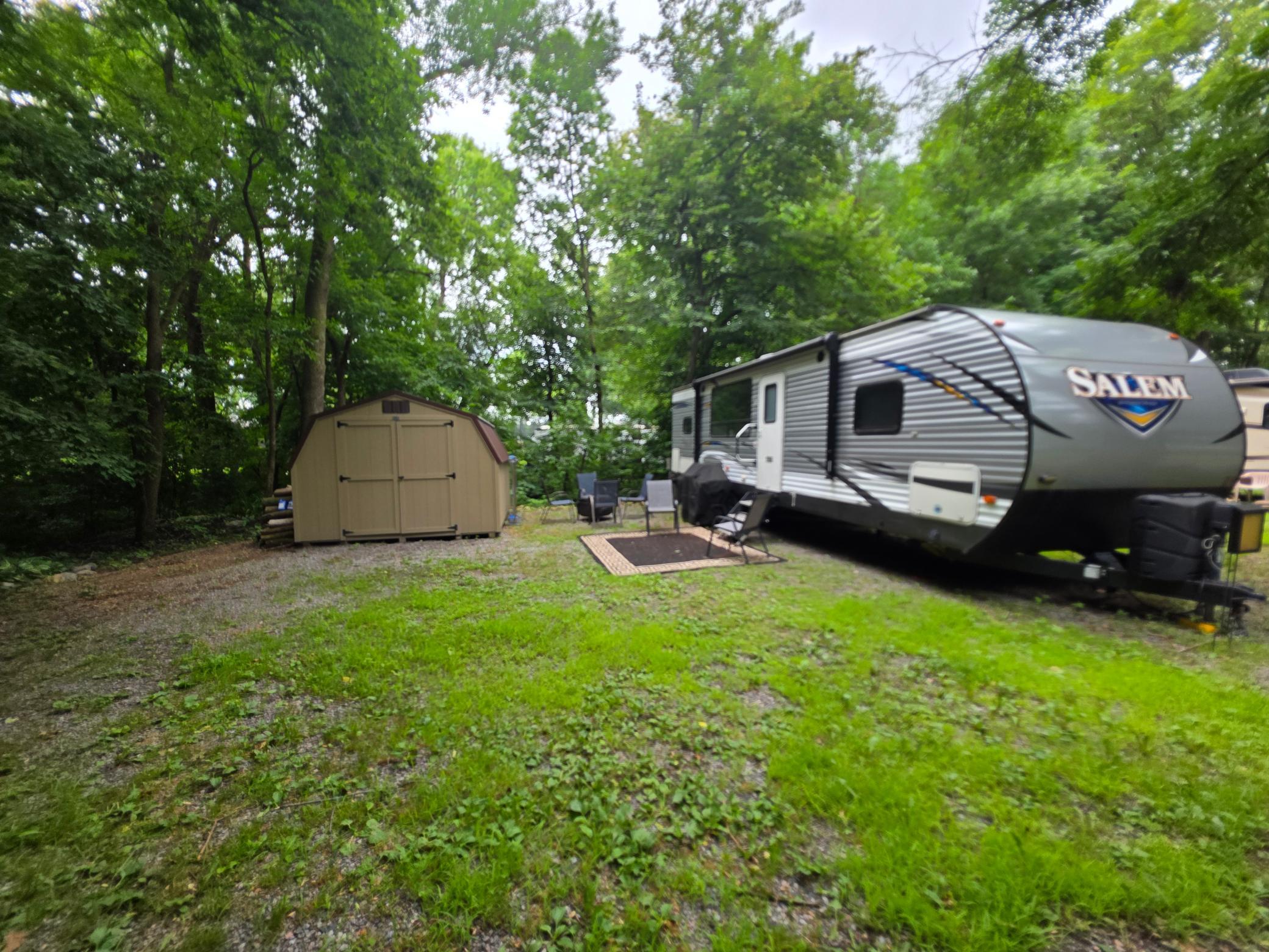 Unit 412 of Cokato Lake RV Resort is a fairly private "lot" with a nice shed, well landscaped. RV and "lot" may be sold separately and if RV is sold first, it will be removed and "lot" sold separately.
