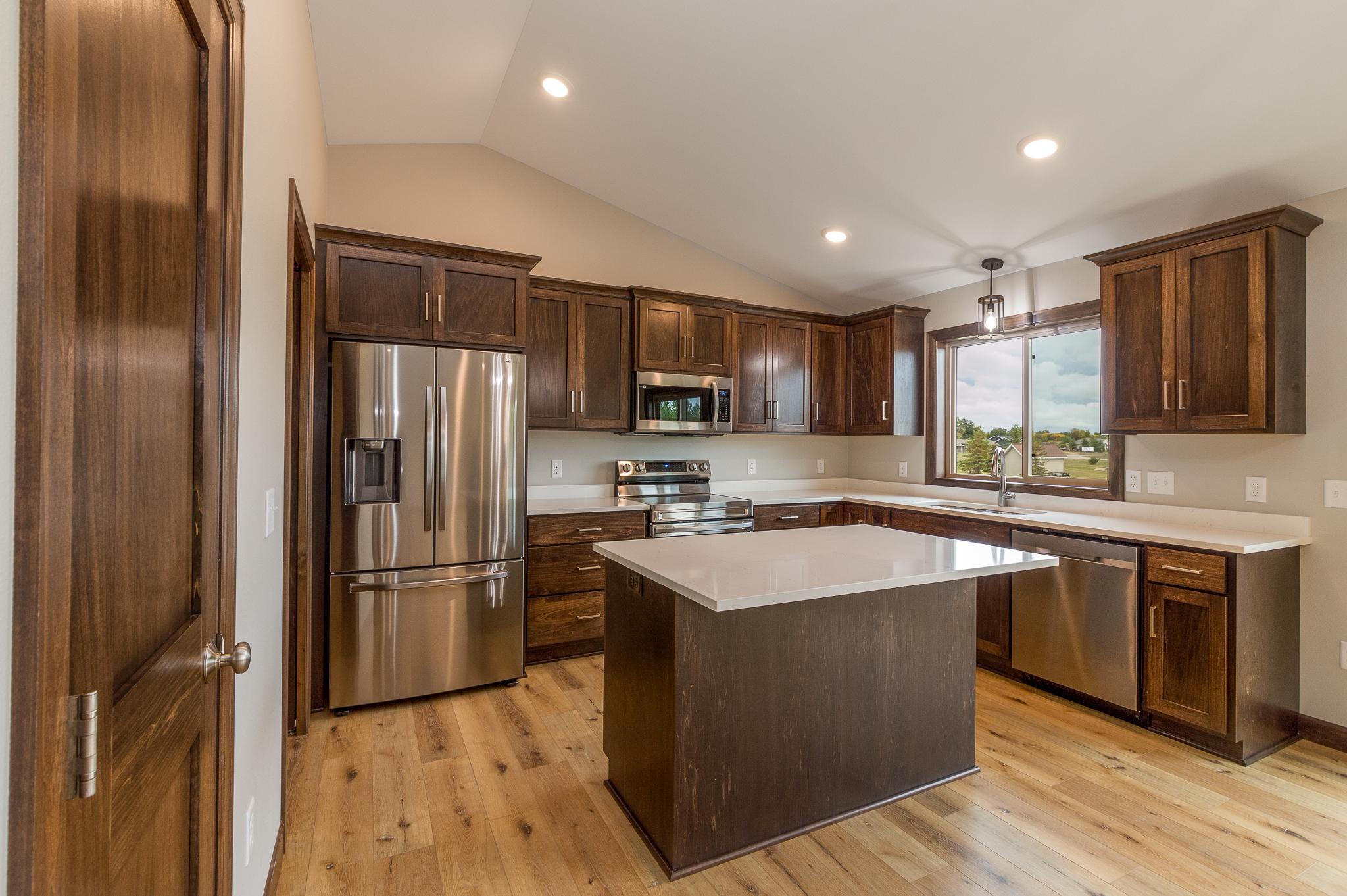 Full appliance package, big center island for meal prep and casual dining and entertaining