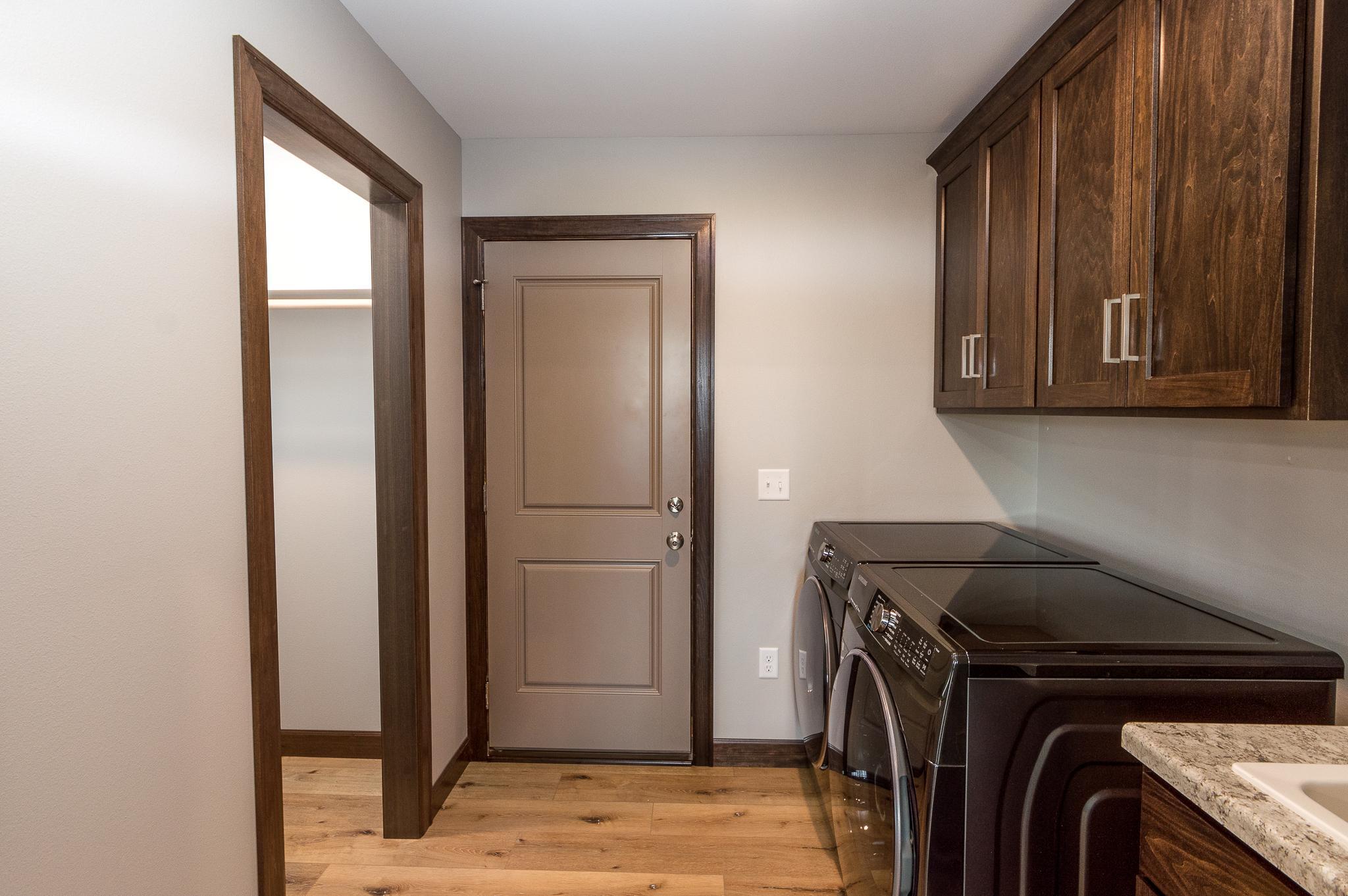Laundry room complete with wash tub/sink and a great drop zone for the active family