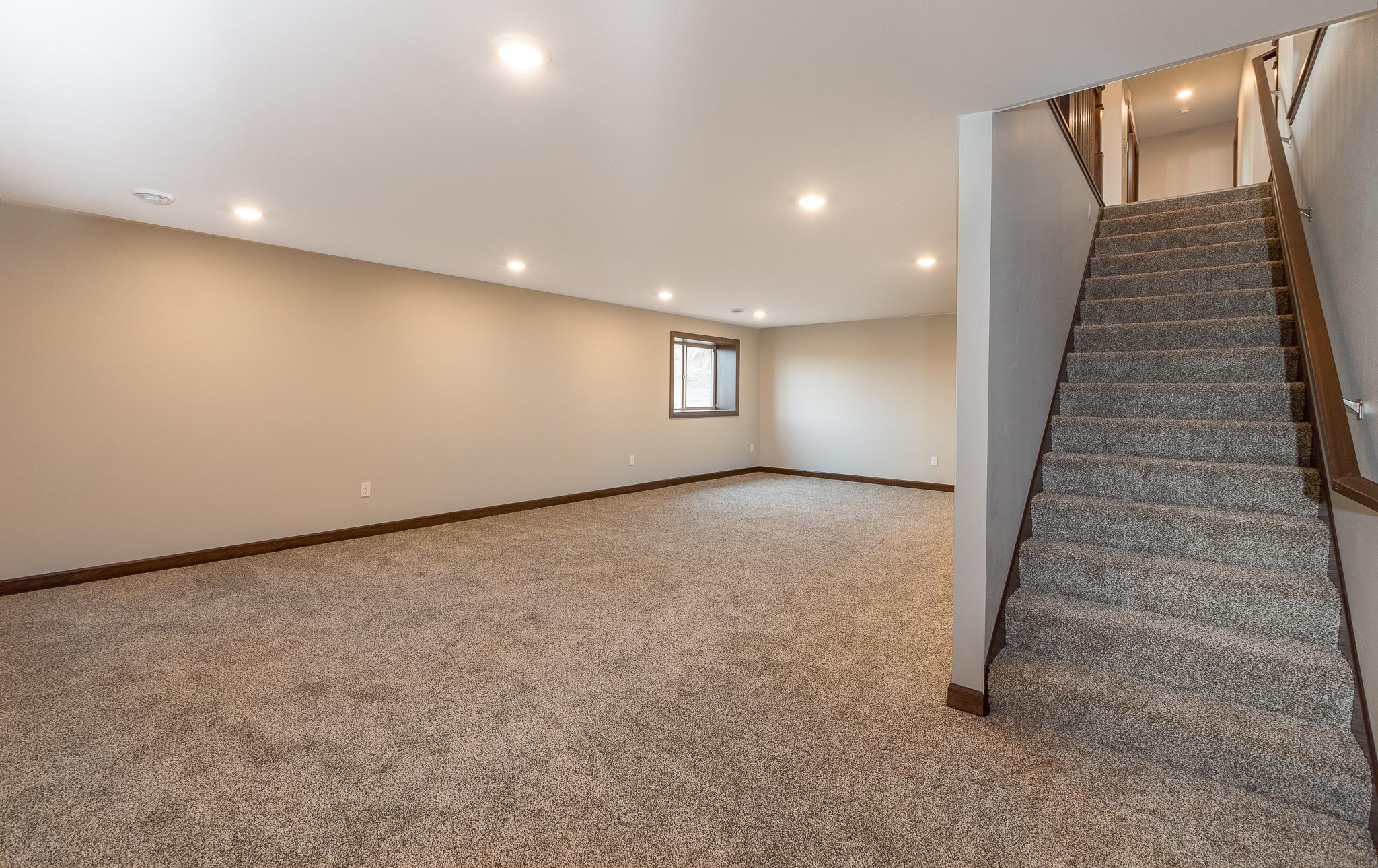 Fully finished lower level provides for a large family or recreation space with daylight windows for maximum natural light