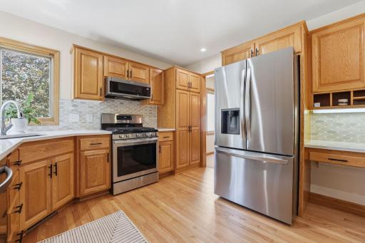 Newer gas range, microwave, and refrigerator! The range has been converted to gas!