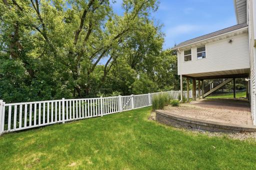 Fully fenced in backyard! Gutter Guards! The underdeck could be screened in for an additional hang out space. Patio is under the porch too!