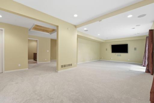 The huge lower level features a living room, recreational space, 5th bedroom, and a wine room!