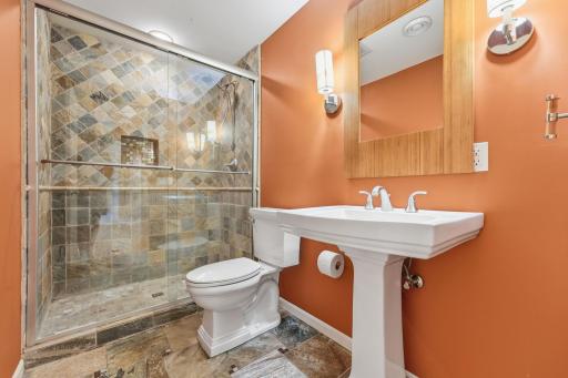 Lower level 3/4 bathroom has a huge walk-in tile shower!
