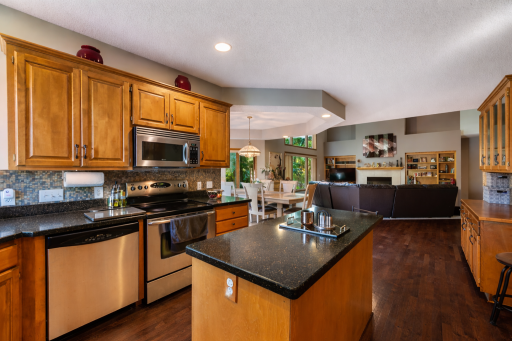Spacious open-concept kitchen and living area.png