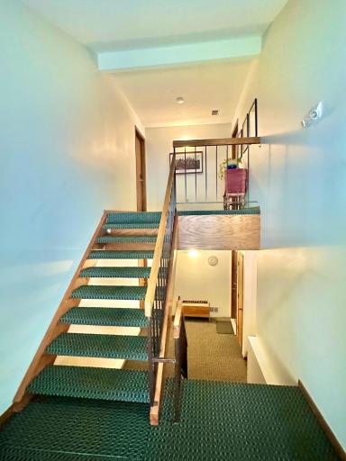 The hall entry to your new home and your unit is up and on the left.