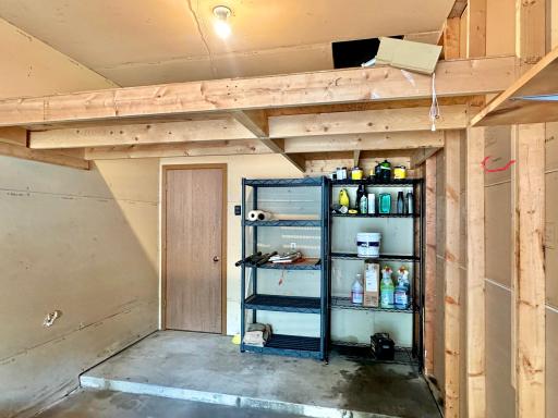 The garage has over head storage, a very good thing to have.