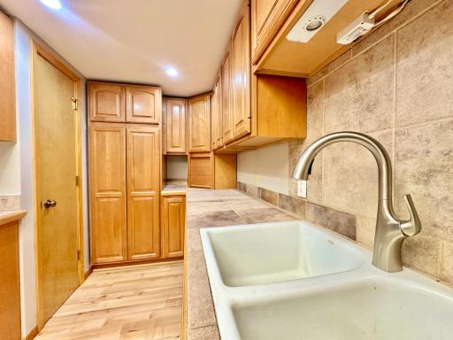 Be sure not to miss the pantry closet shown here on the left.
