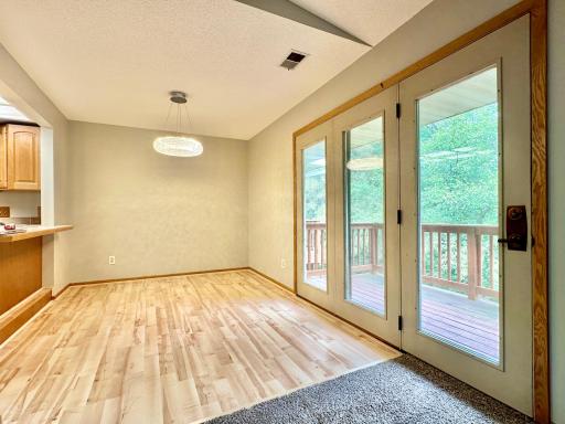 Good space to the dining room and the deck steps away is just an extension of your living space.