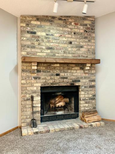 The fireplace warms the place regardless of season.