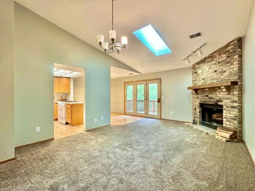 Welcome to 18462 Creeks Bend Dr., Minnetonka, MN! The vaulted ceiling gives a big, airy feel to this open floor plan.