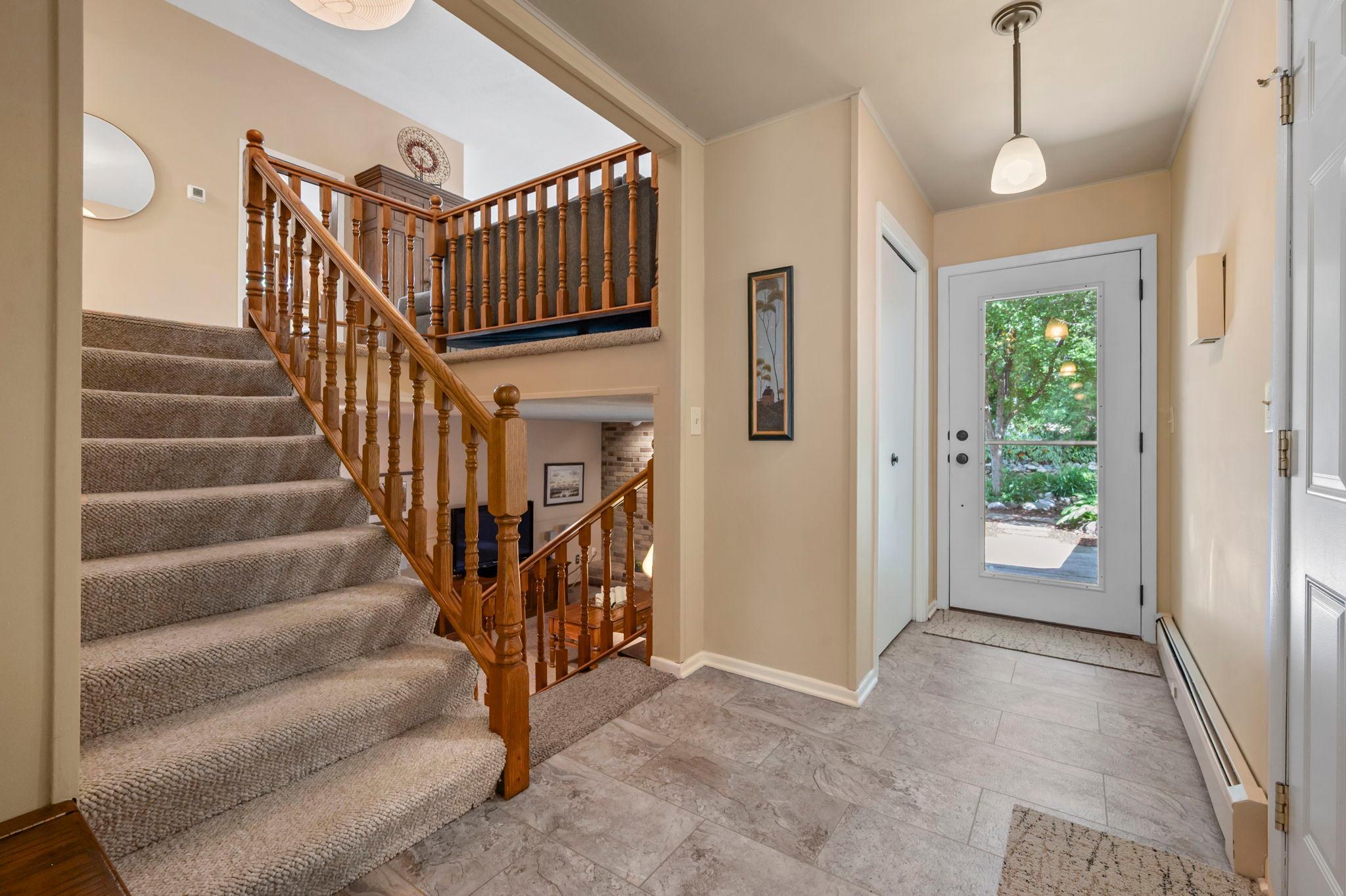 Back door entry, there are 3 coat closets in this foyer