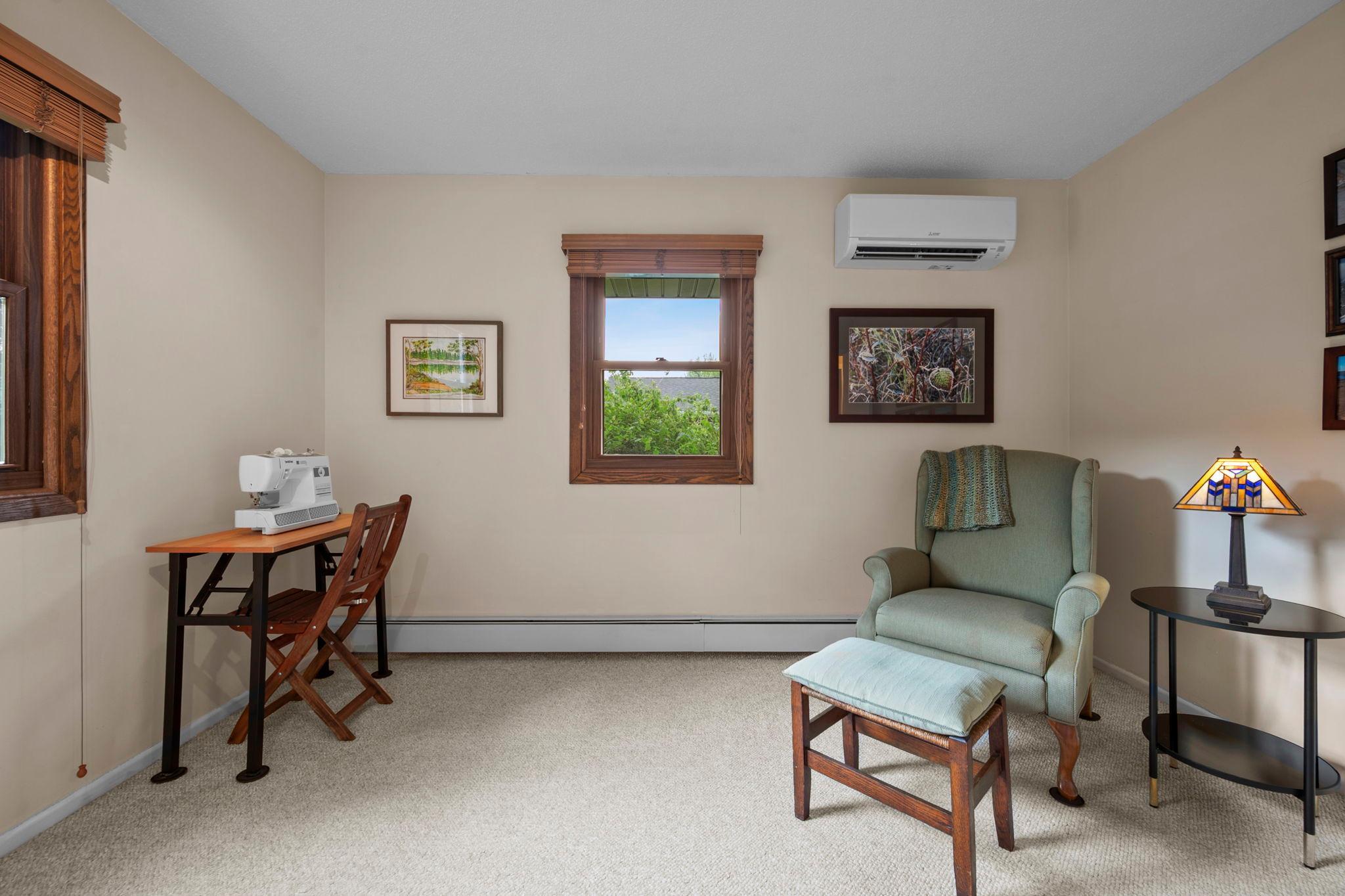 bedroom with A/C unit