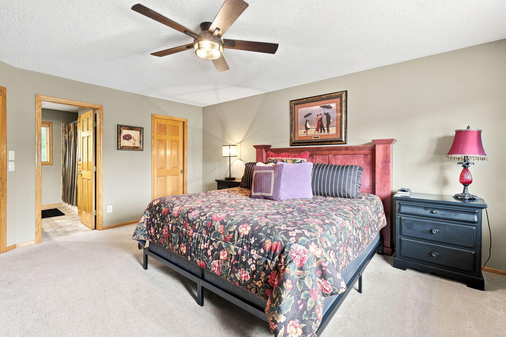 Large primary bedroom suite with a WIC and private full bath.