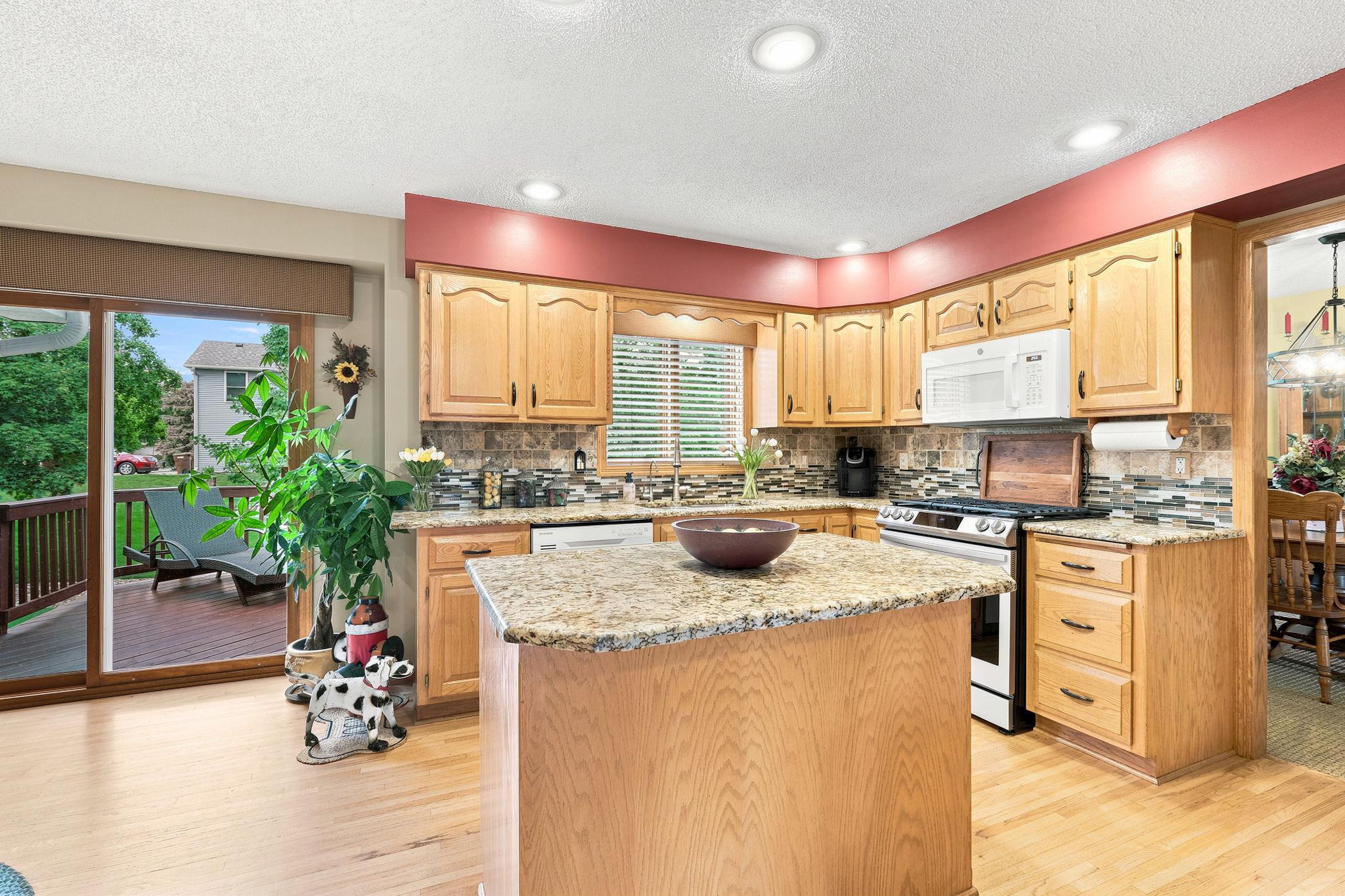 Center island with granite and outlets for easy entertaining.