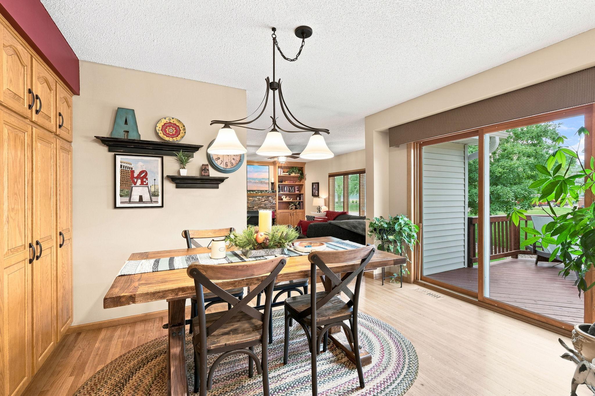 Kitchen/dining space leads out to the recently refinished back deck.