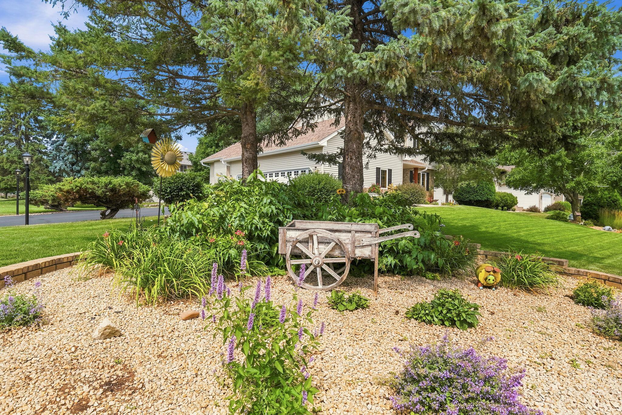 Beautiful landscaping throughout the yards.