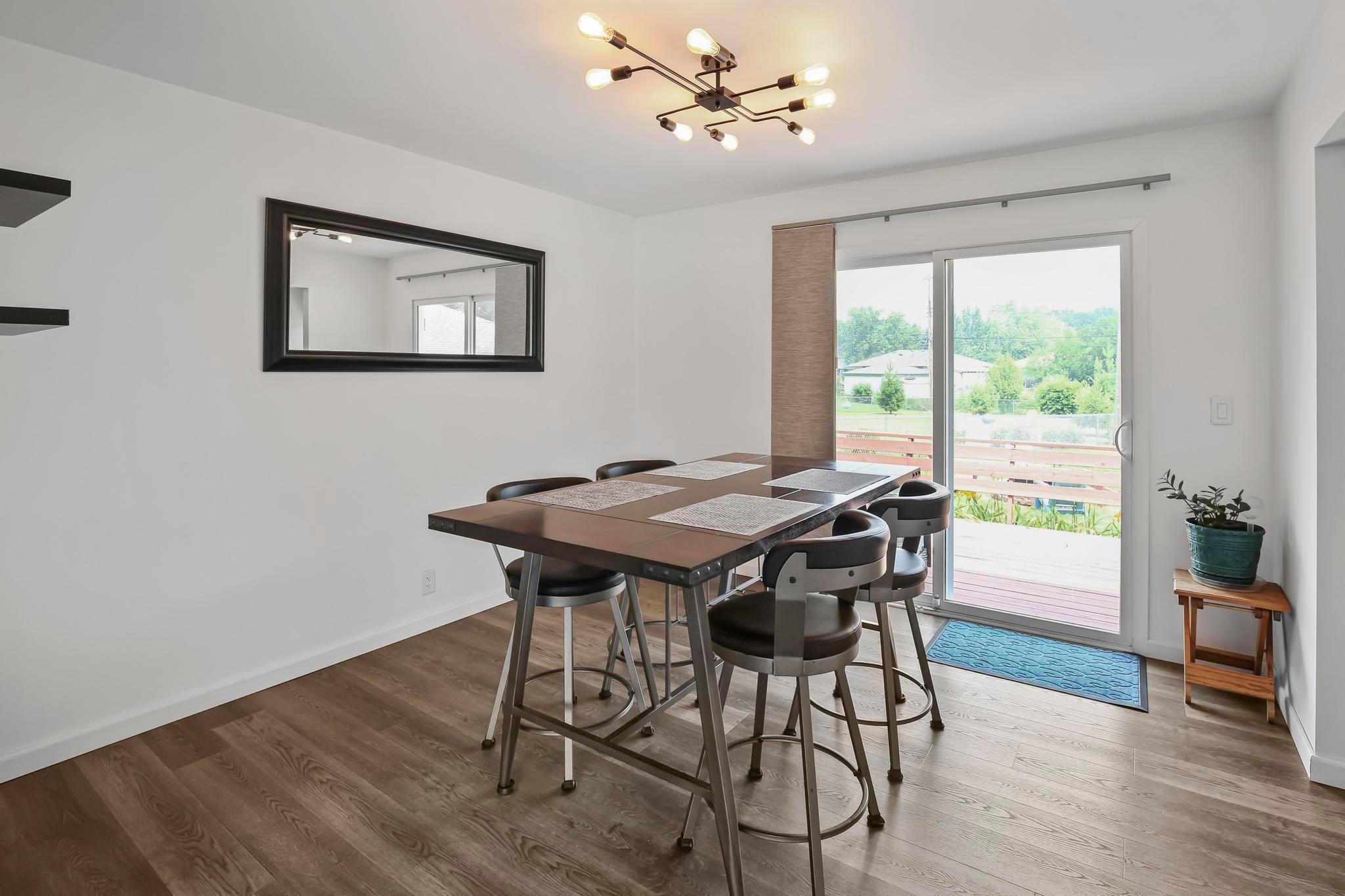Dining room that walks out to the deck and patio