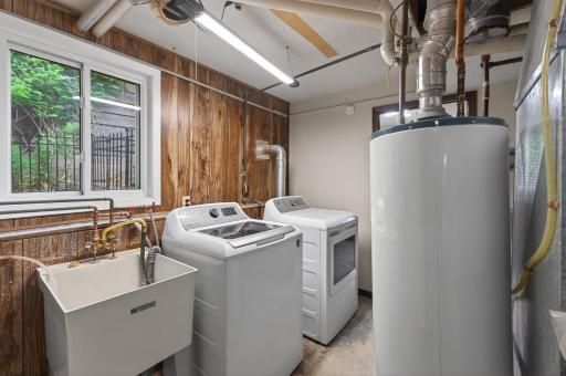Lower level utility room with laundry and sink