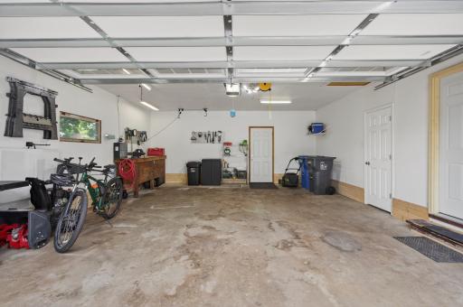 Large 2 car garage with bonus storage room and entrance to back yard