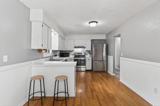 Updated kitchen with beautiful hardwood floors