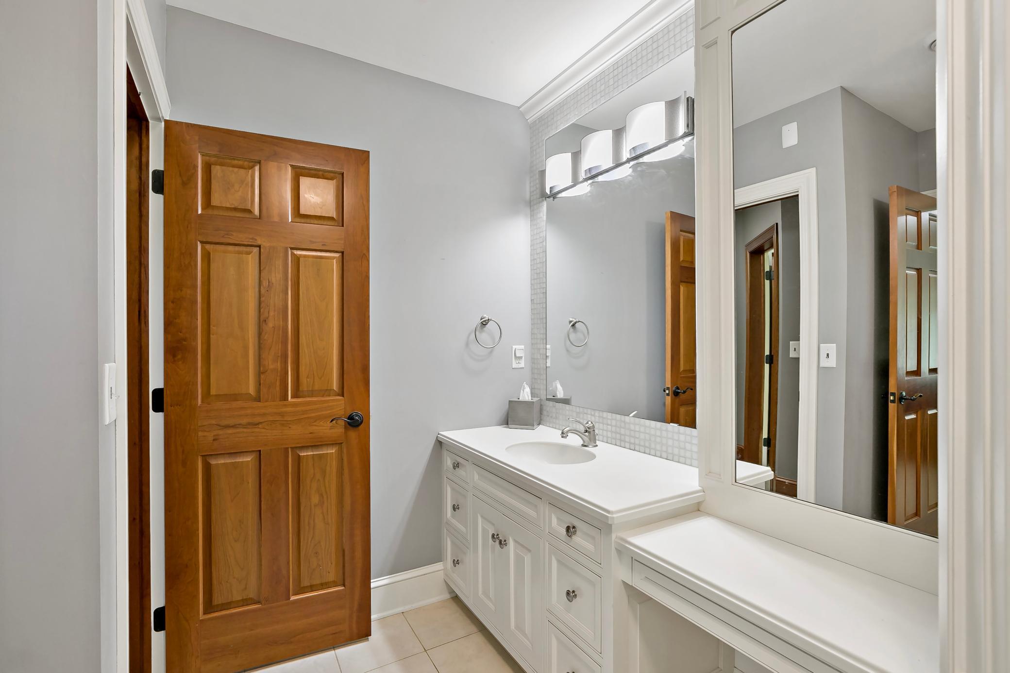 Well-appointed en suite baths elevate each bedroom, offering privacy and a true guest-suite experience.
