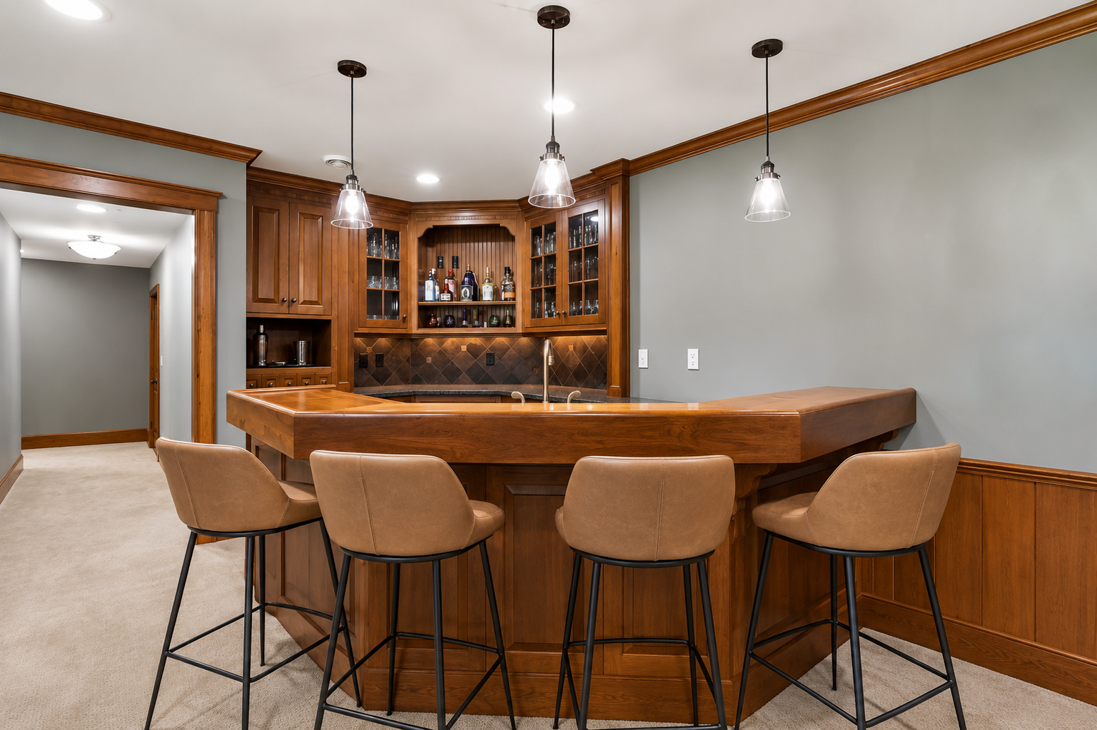 Host unforgettable gatherings in this walkout lower level complete with a full wet bar, game space, and stunning custom stone fireplace.