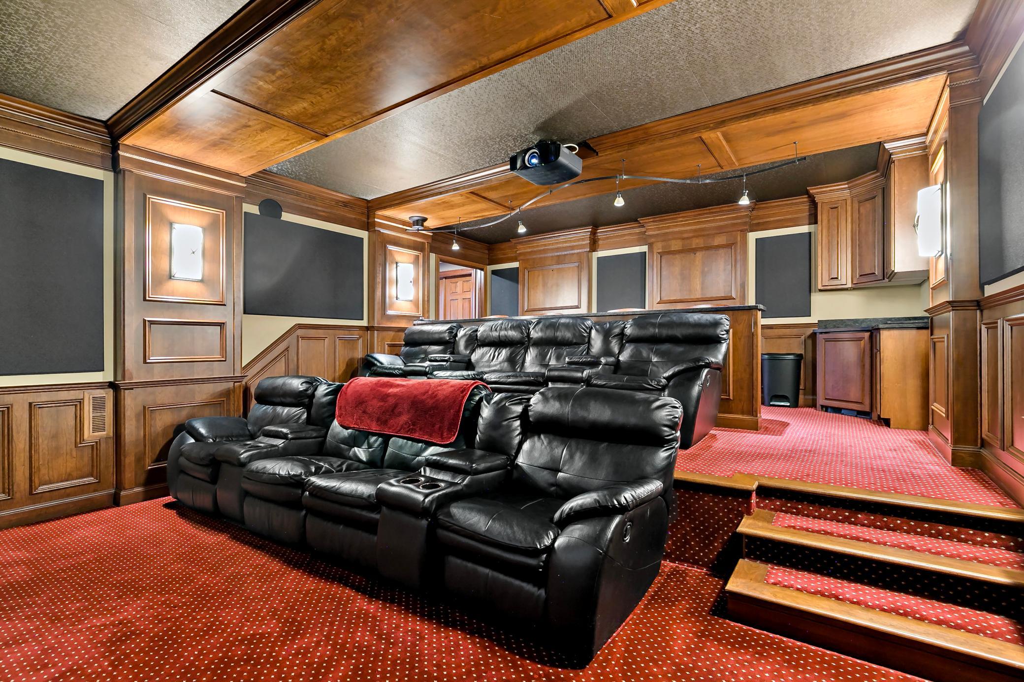 A true home theater built for movie nights and championship weekends, with wiring in place for three additional TVs to create the ultimate sports-viewing destination.