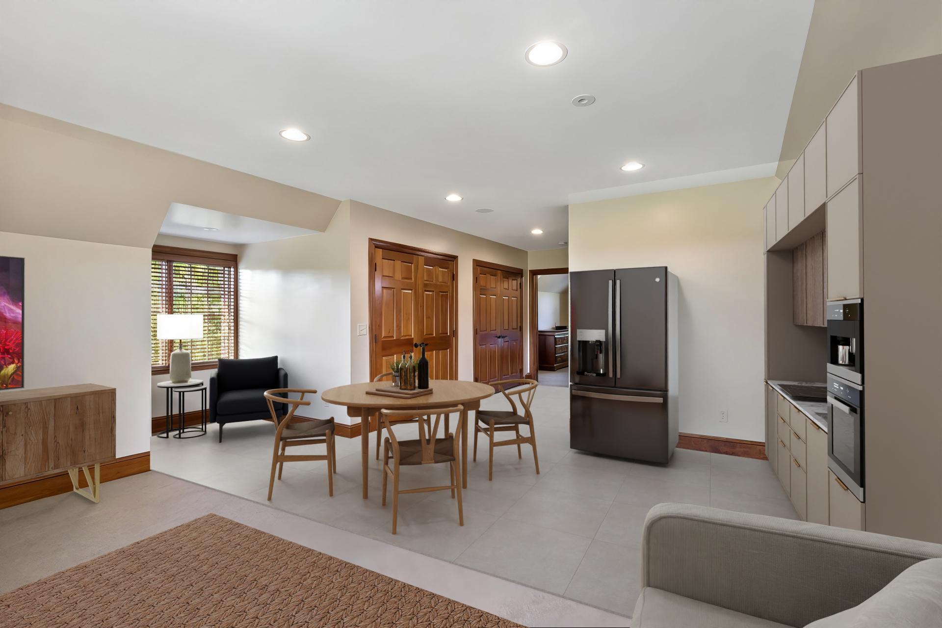 Digitally staged to show future kitchen possibility for private living quarters.