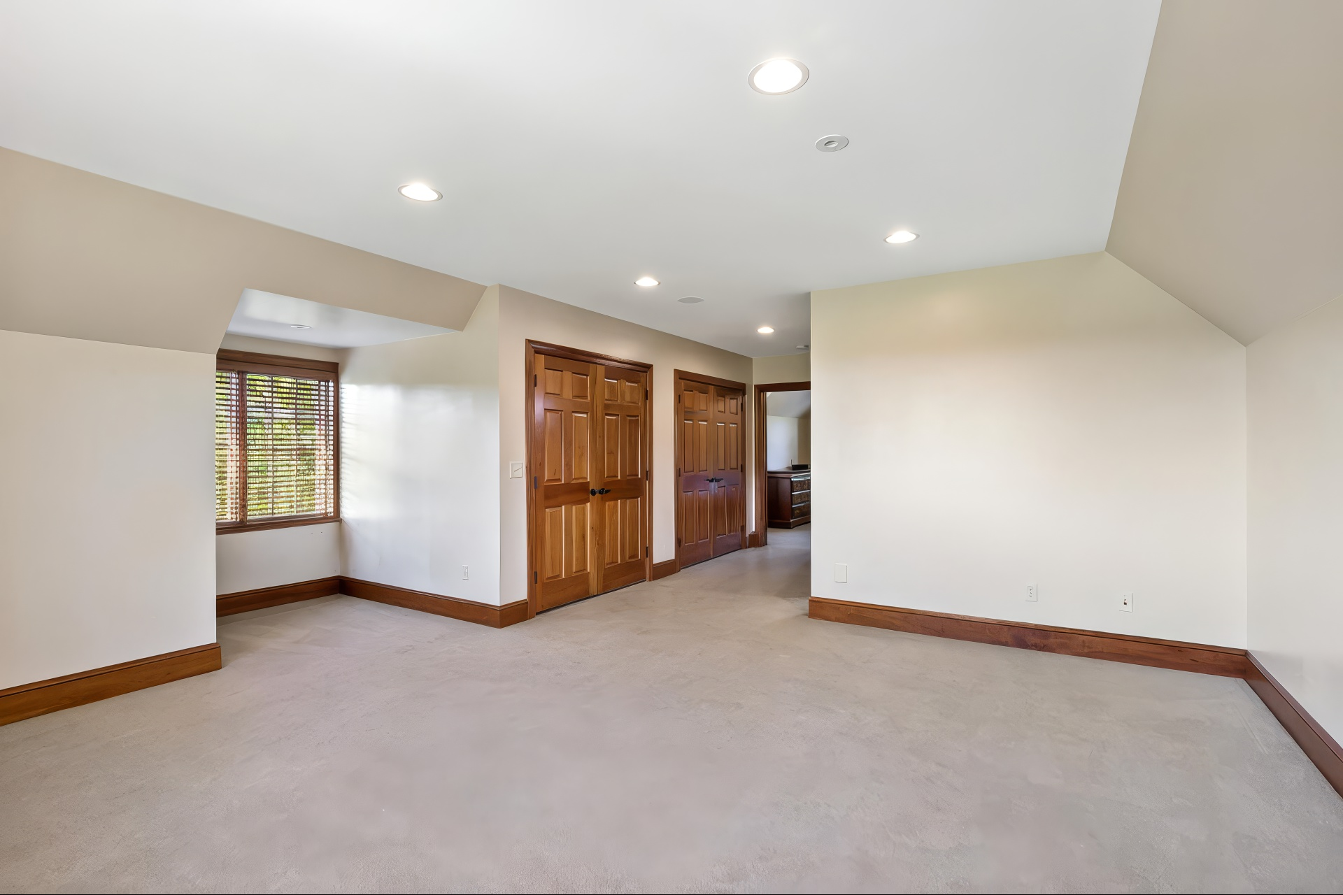 Rare private suite above the garage—ideal for extended family, visiting grandchildren, a home office, guest quarters, or a second living space.