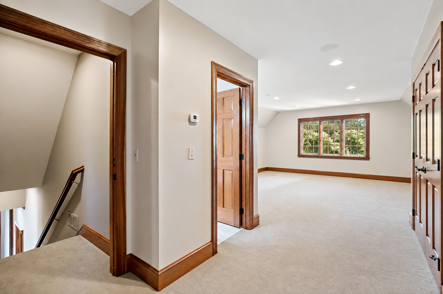 Private upper-level living quarters offer exceptional flexibility for multigenerational living, long-term guests, a live-in nanny, or a private executive retreat.