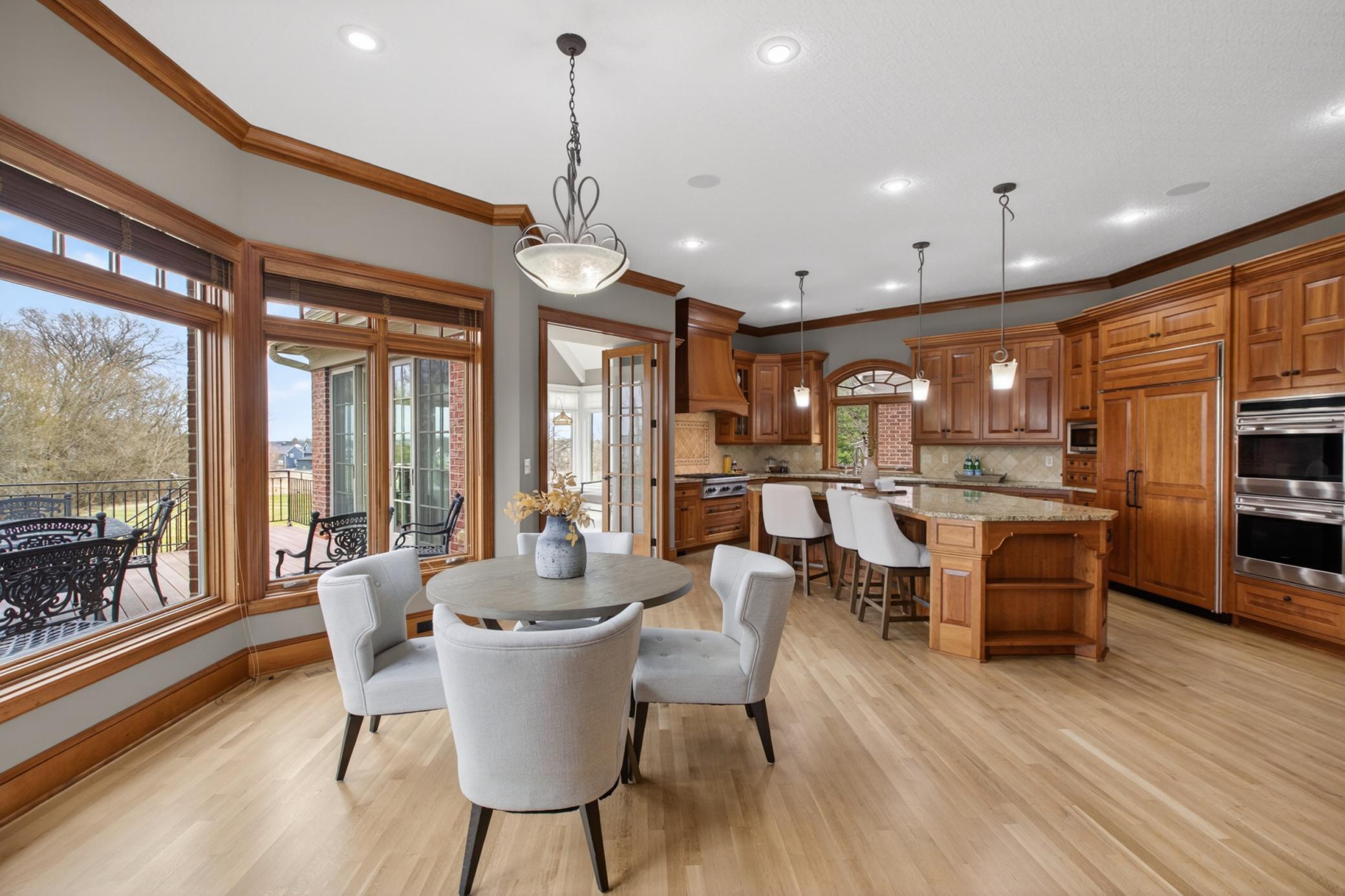 The heart of the home features custom cabinetry, premium finishes, and effortless flow for entertaining family and guests.
