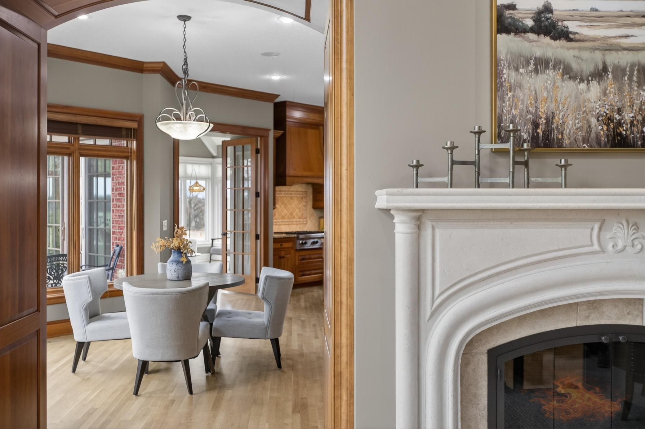 Designed for everyday living and entertaining, the gourmet kitchen opens seamlessly to the dining, living, and sunroom.
