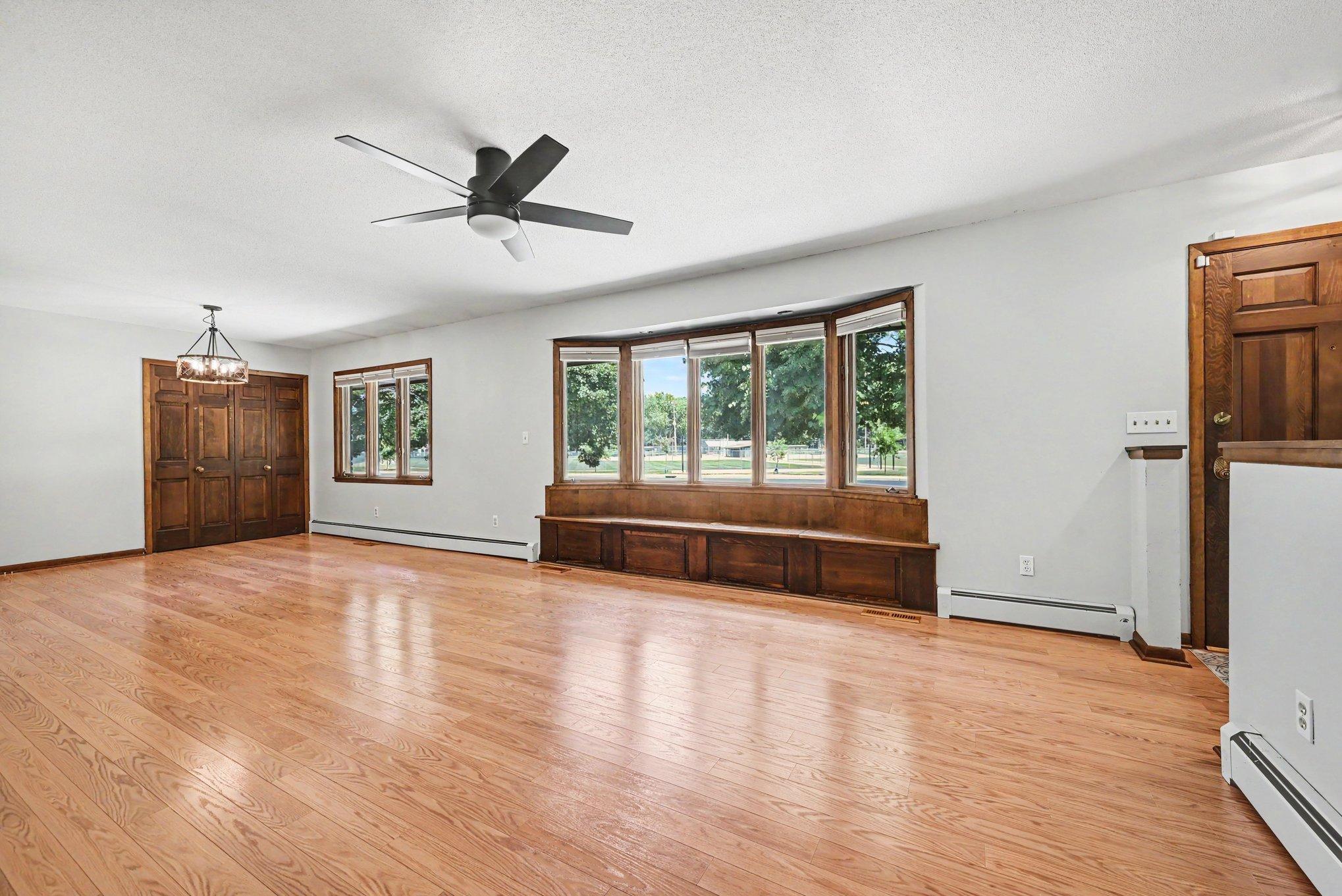 Large living room and dining area with storage.