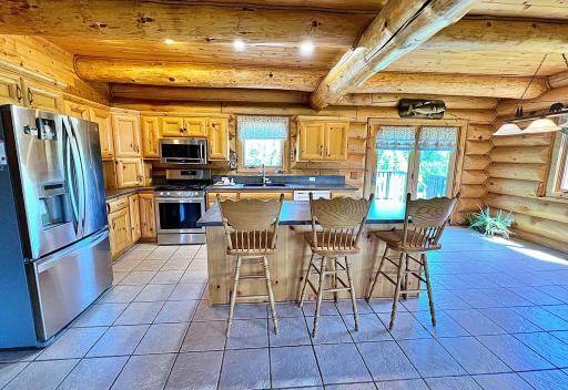 Kitchen with double doors leading to deck.jpg