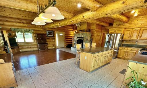 Main living space Kitchen Living room with Stone fire place.jpg