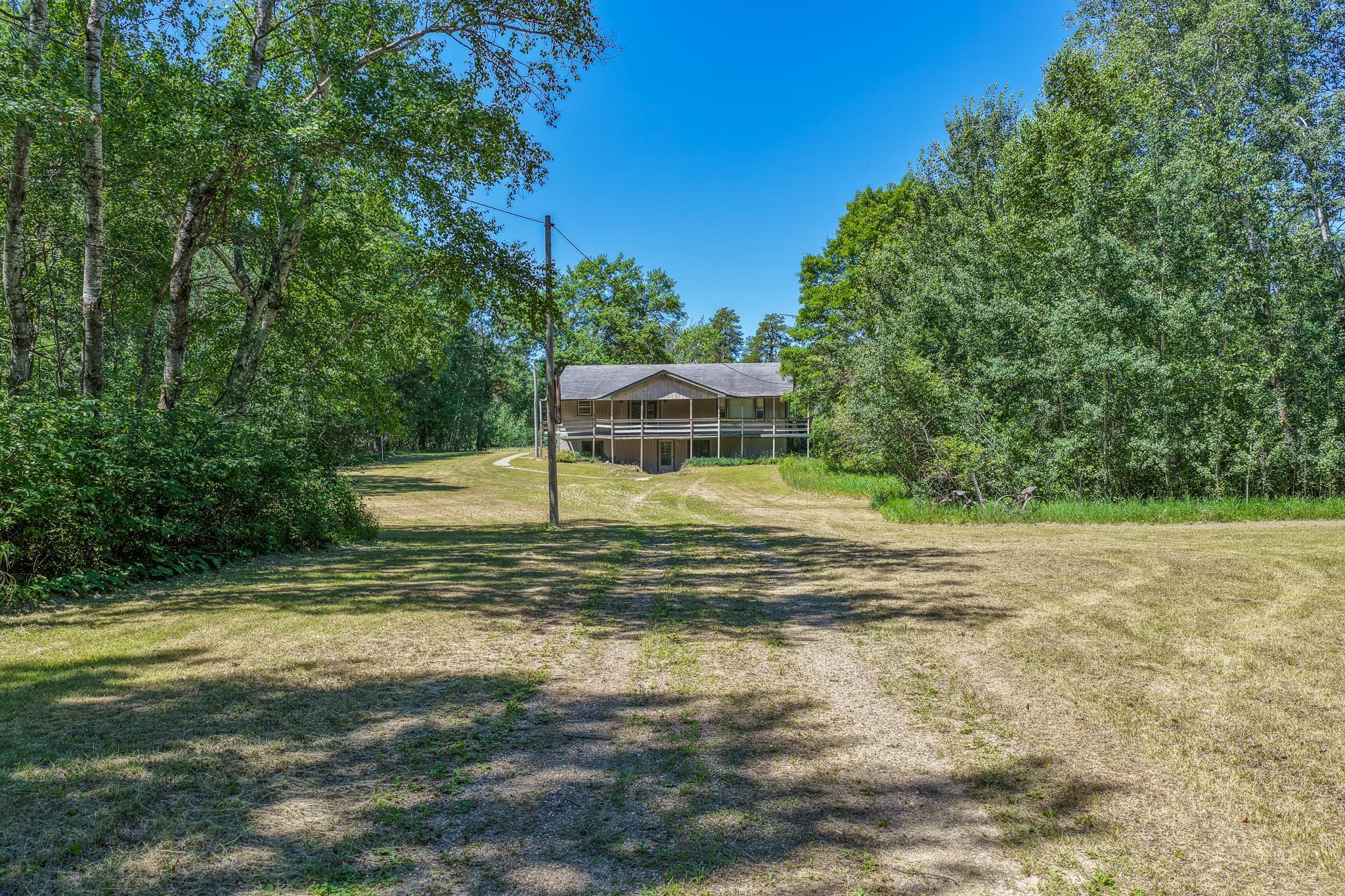 7+ Acres, 4B/2B, Garage, Stable