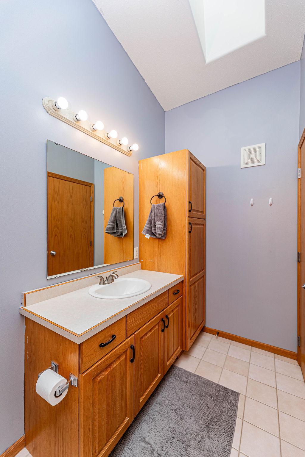Full Bath w/ Linen Storage
