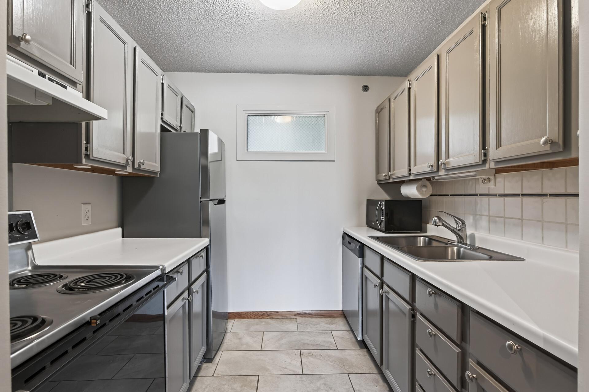 Kitchen with abundance of cabinets