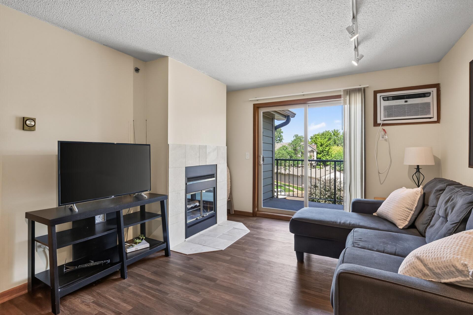View of Wood Burning Fireplace and Deck